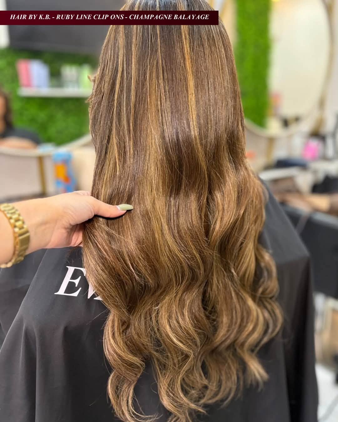 Client with glossy champagne balayage waves created using EvaLuna Ruby Line clip-on hair extensions